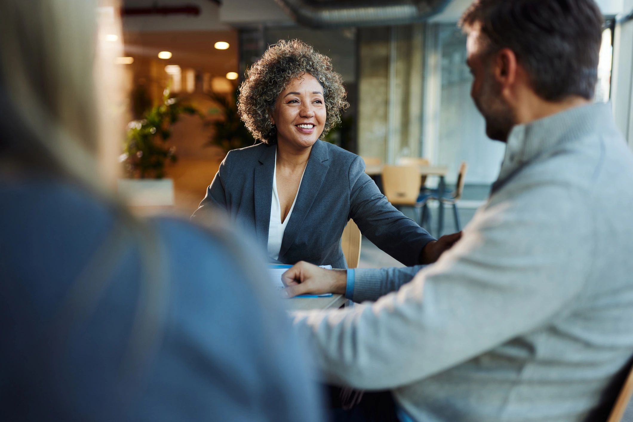 Immigration consultant meeting with clients